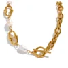Sfc2b89b7c2b846b7bc60779800597e9cR.webp The Aura Pearl Toggle Necklace – 18K Gold PVD Plated